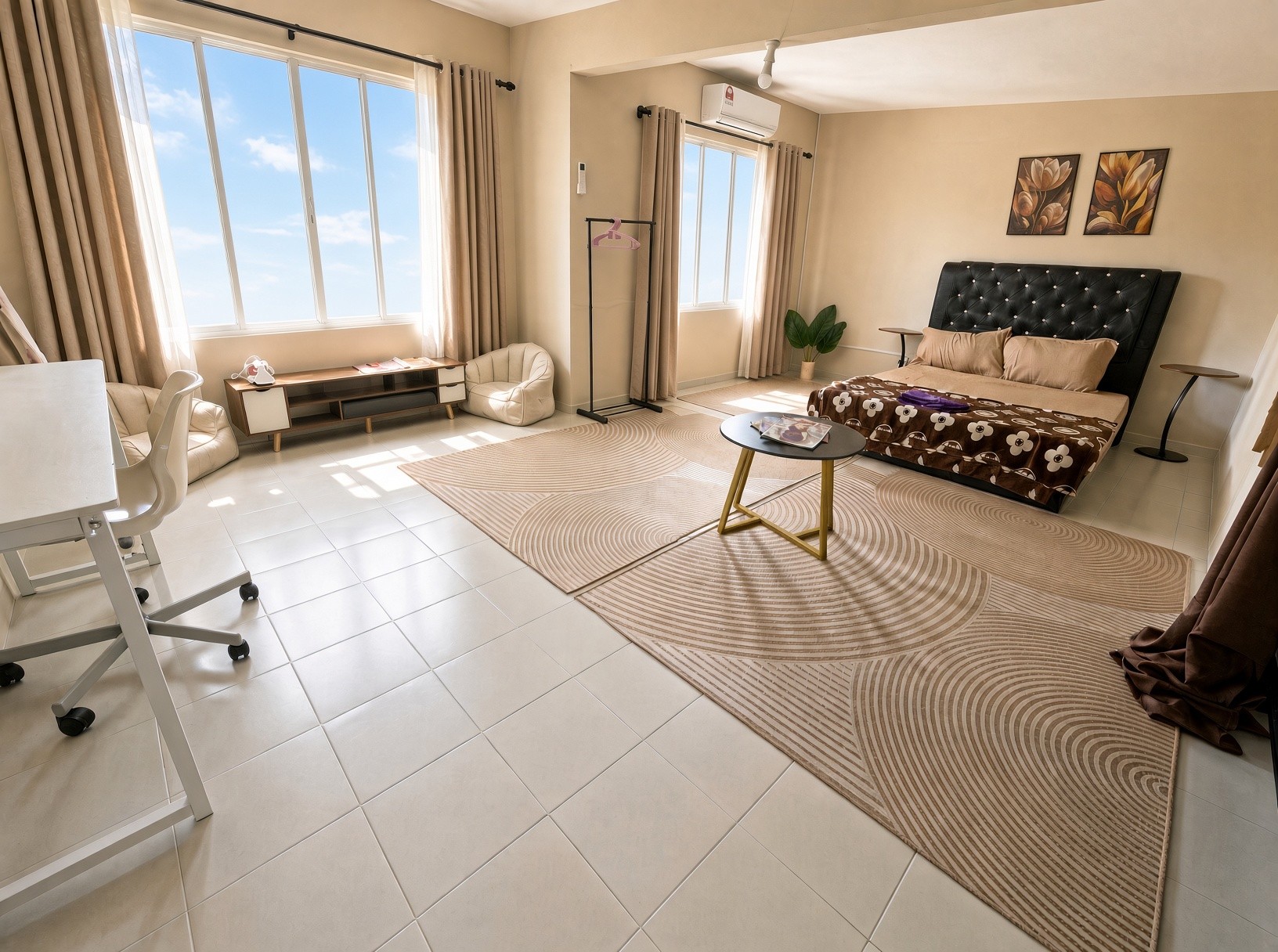 Large bright master bedroom with tufted bed and big windows at Aydan Wonderland Homestay Kuantan